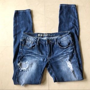 Machine distressed skinny jeans 11/12